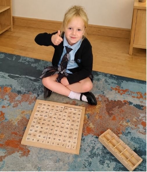 Elementary students working with Montessori materials at Alive Montessori in Toronto